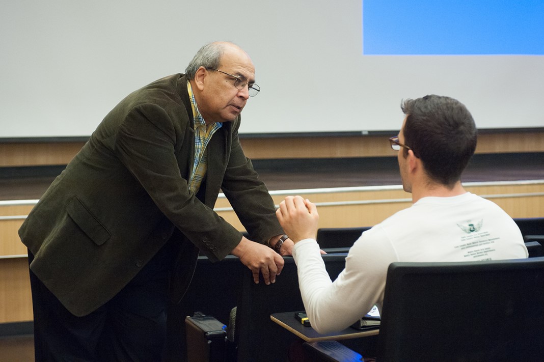 teacher talking to his student