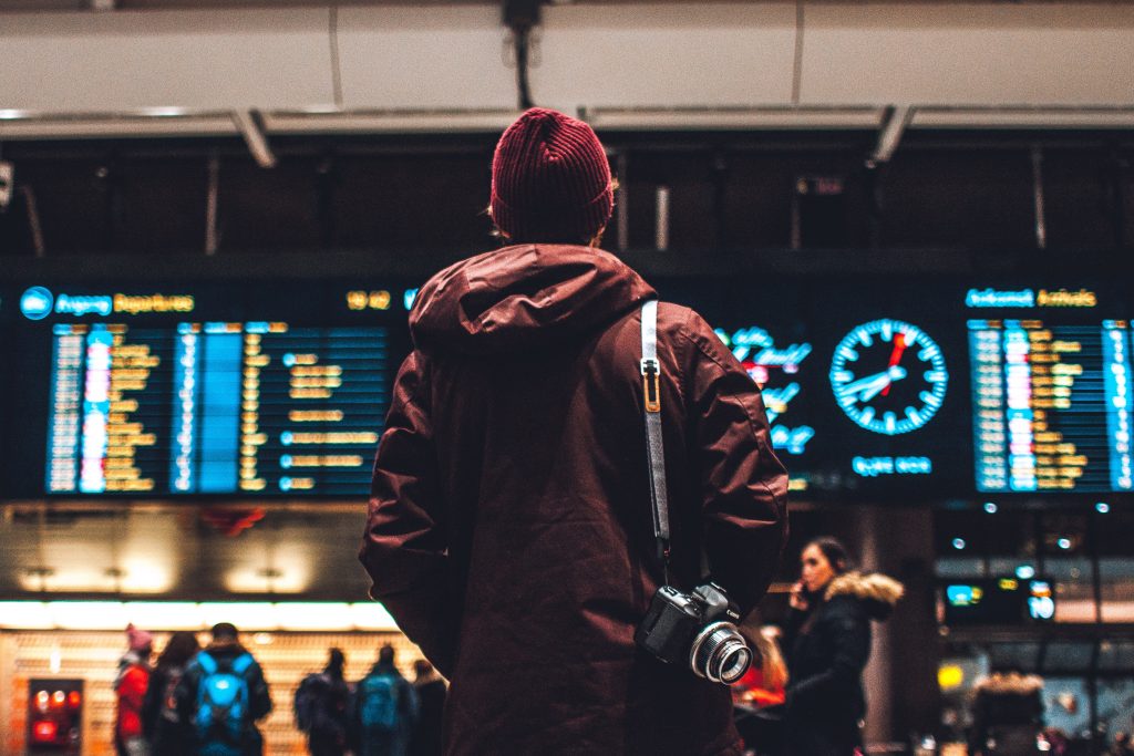 Guy with camera in the airport 