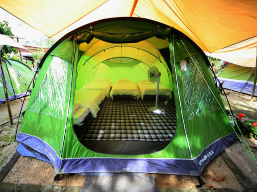 Tent with a fan and beds