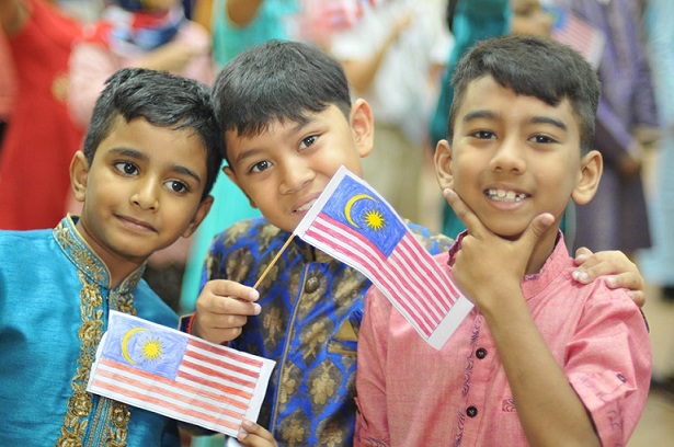 Kids holding flags