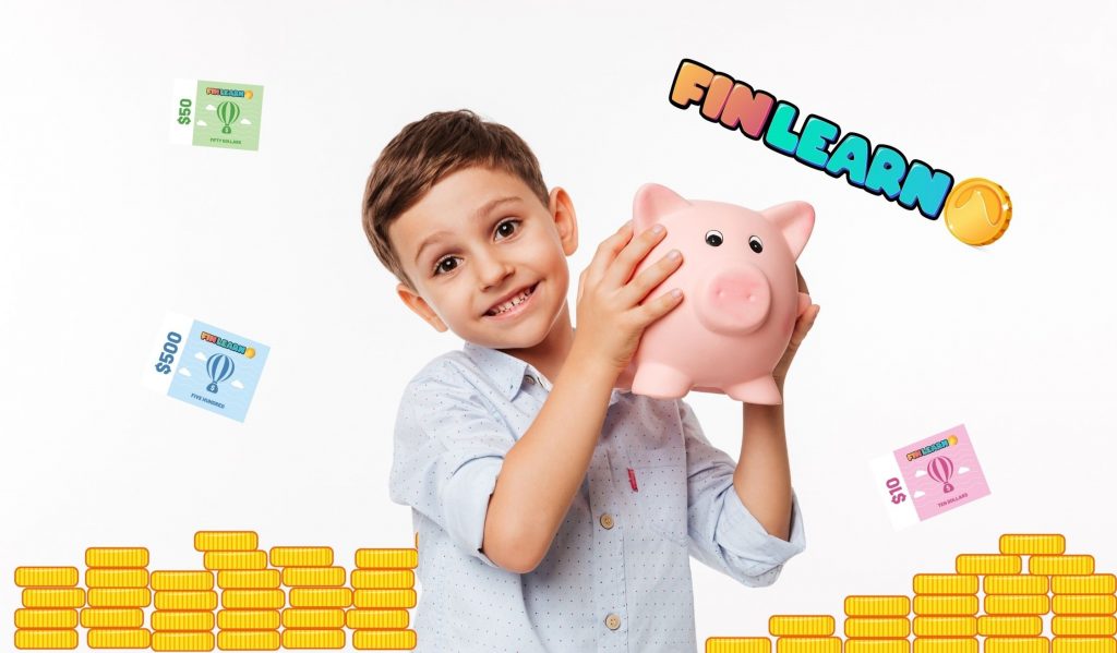 Boy holding a piggy bank looking happy with money