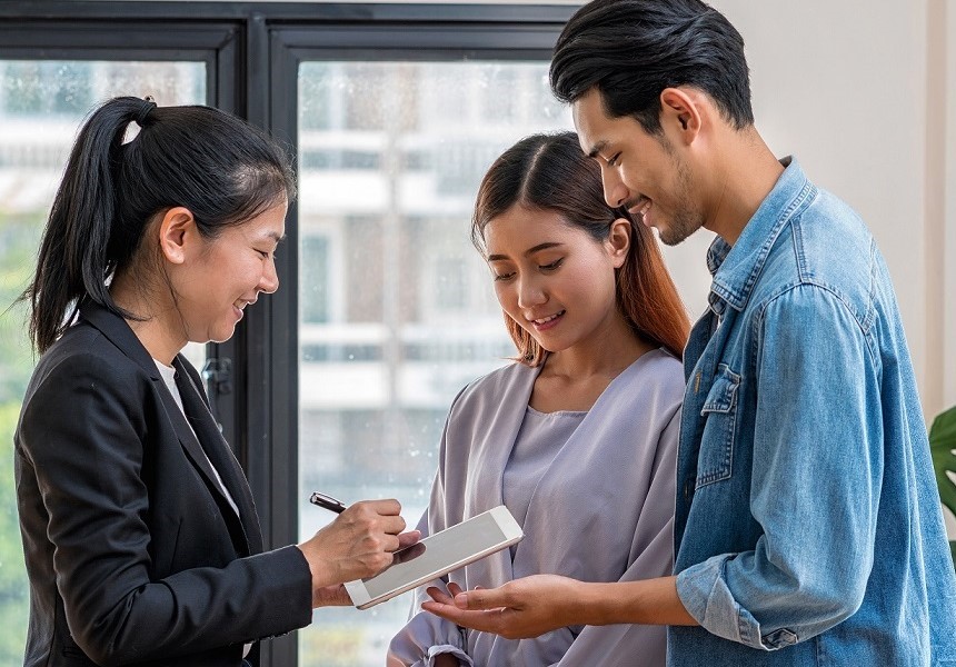 Sales Representative speaking to a couple